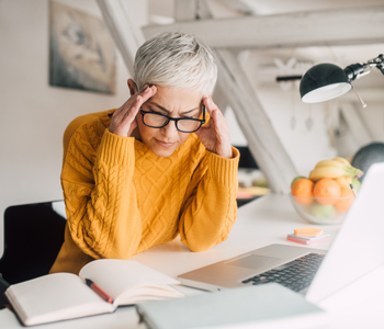 Pastors Wives Depression and What can Cause it like represented by this woman at her desk